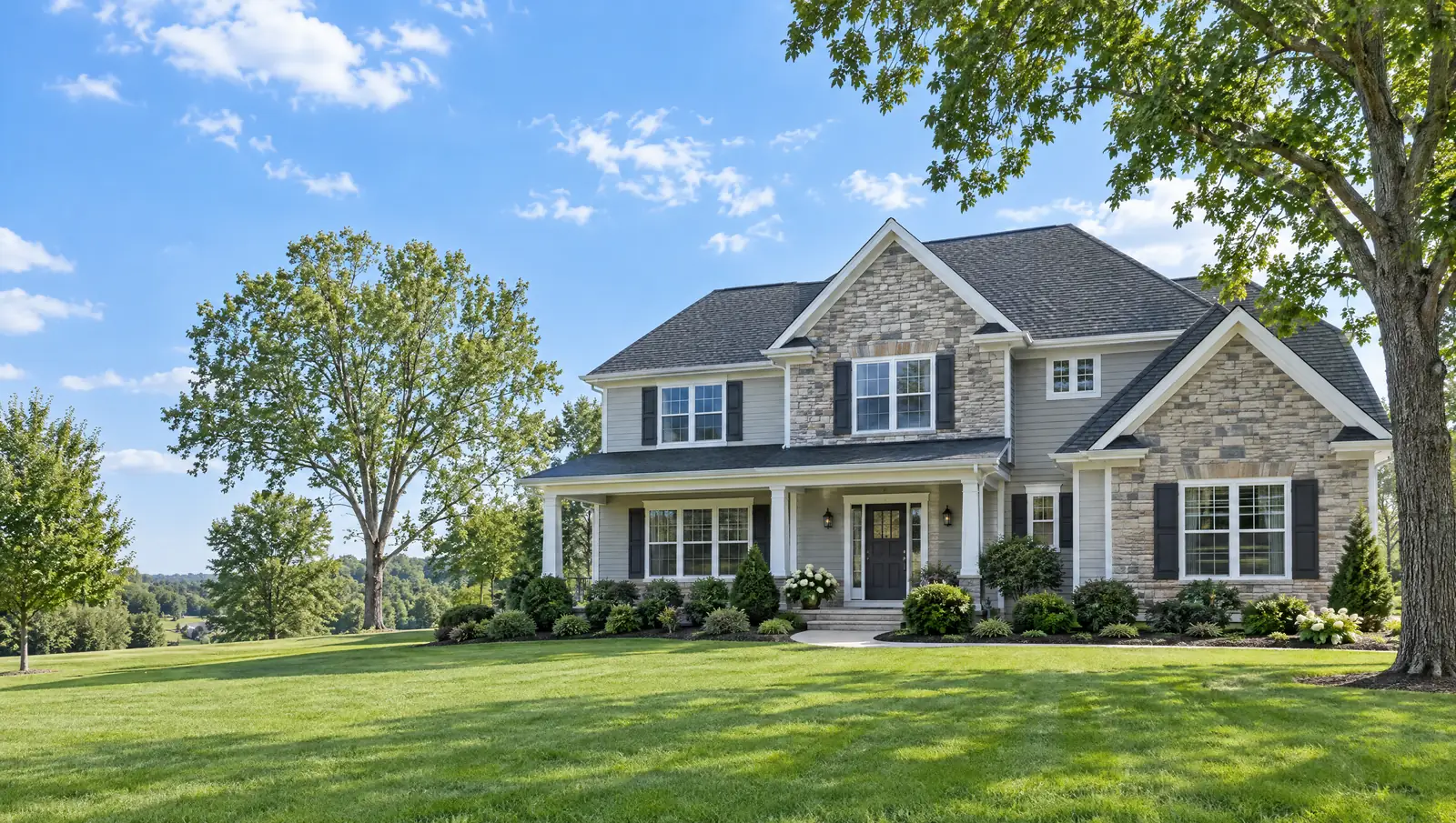 Two-story home in Kentucky with a new dark shingle roof on it